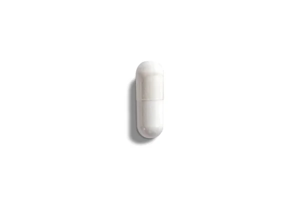 White capsule, isolated on wtite background. Healthcare medicine concept — Stock Photo, Image