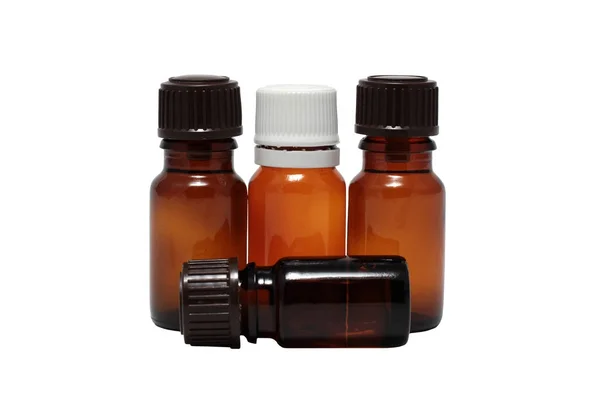 Vier Flaschen Aromatherapie-Öle isoliert — Stockfoto