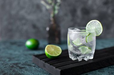 Cold cocktail with lime clipart