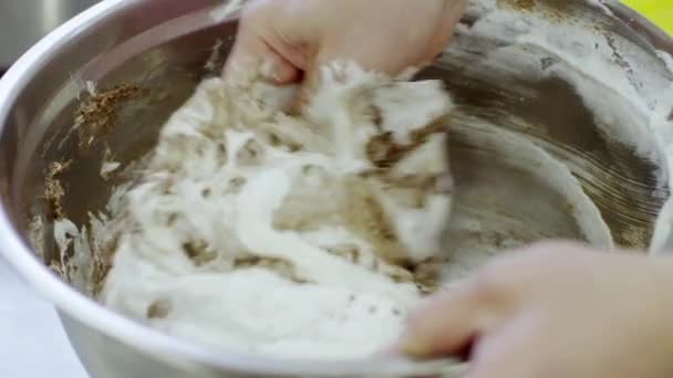 Woman hand kneads the dough — Stock Video