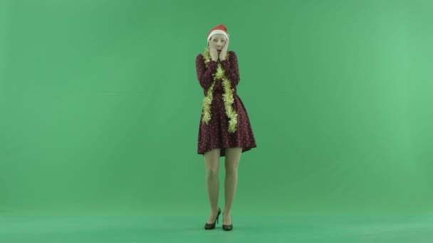 Молода жінка Різдво показується щастя на зелений екран — стокове відео
