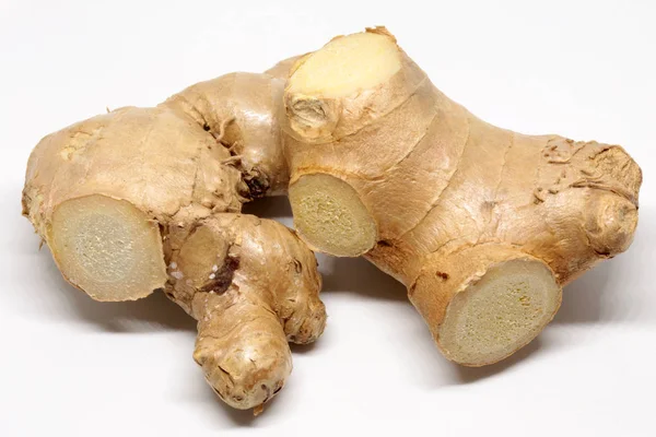 Cut ginger on white — Stock Photo, Image