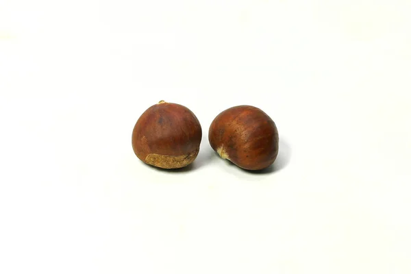 Fresh chestnuts isolated on white — Stock Photo, Image