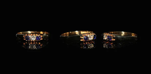 Ékszerész gyémánt gyűrű és drágakő, a fekete háttér Jogdíjmentes Stock Képek