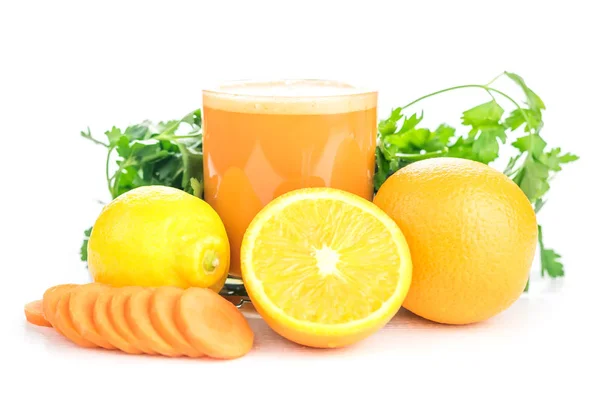 Carrot smoothies with orange and lemon on a white wooden table. — Stock Photo, Image