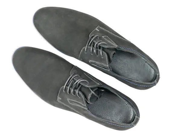 Sapatos masculinos clássicos feitos de couro genuíno isolado em um fundo branco . — Fotografia de Stock