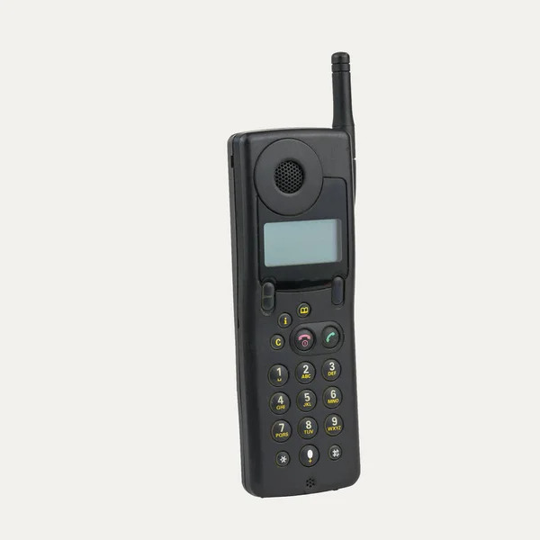 Teléfono móvil vintage con pantalla LCD aislada sobre fondo blanco. Medios de comunicación retro . —  Fotos de Stock