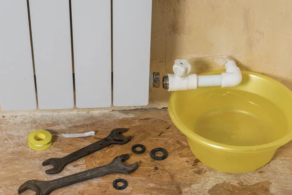 Repair of the heating system in a private house after an accident. Accident of the heating system of a private house.