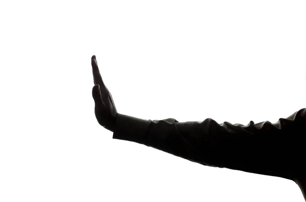 La mano dell'uomo mostra stop, negazione, disaccordo - silhouette — Foto Stock