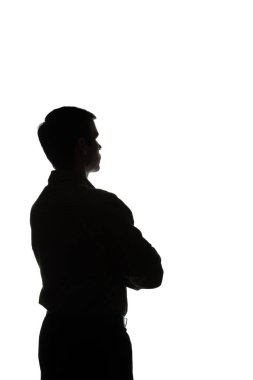 Genç bir adam, görünümü portresi arkadan - siluet