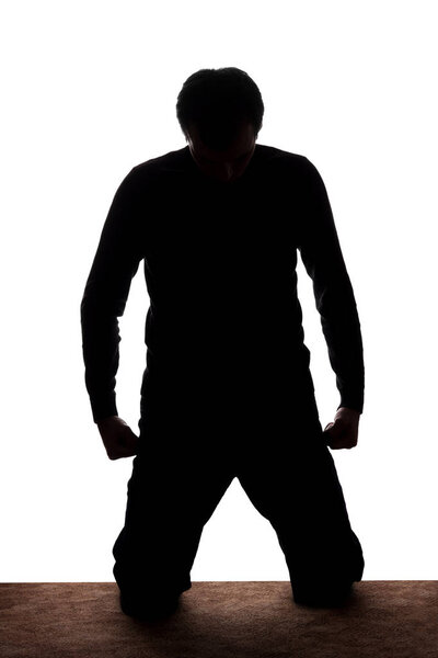 Portrait of a young man on the knees, front view