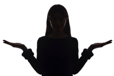 Portre güzel genç kız düşünme ve karşılaştırma, seçim - siluet, izole