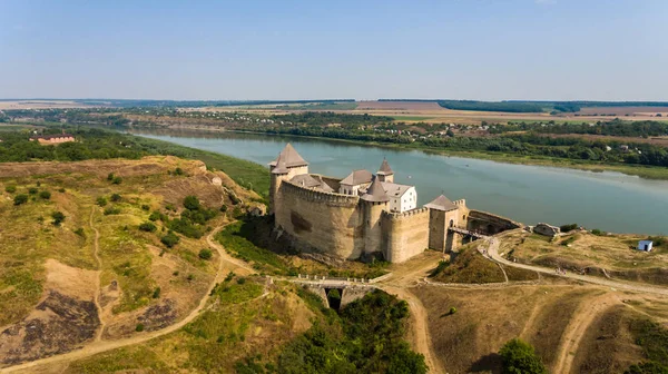 Aerial view of Khotyn medieval castle on the green hill above the river. — Stock Photo, Image