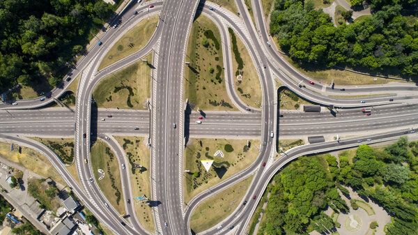 Aerial view of a turbine road interchange in Kiev. Cityscape in summer