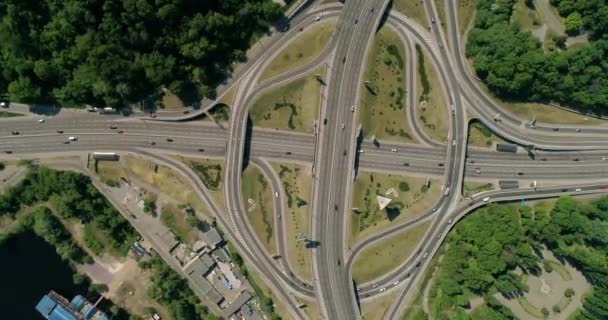 Aerial view of a city traffic on the bridge. — Stock Video