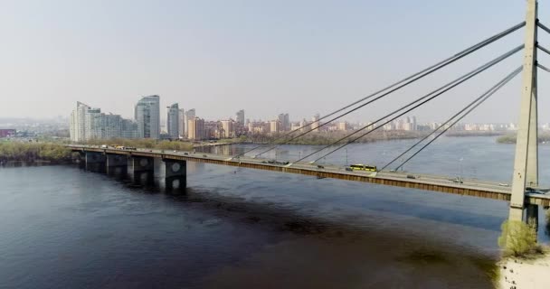 Aerial view of a city traffic on the North bridge. — Stock Video