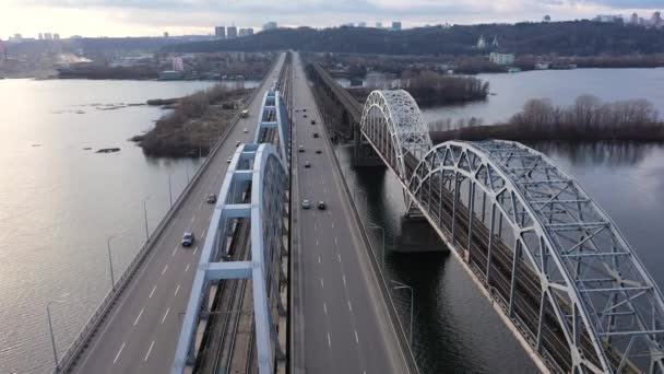 Flying by Darnitskiy Bridge in Kyiv at the winter without snow. — Stock Video