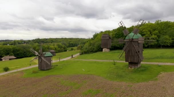 Old wooden windmills at ethnographic museum. — Stock Video
