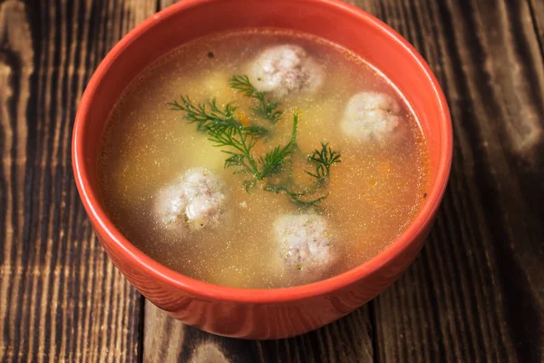 A bowl soup with meatbolls — Stock Photo, Image