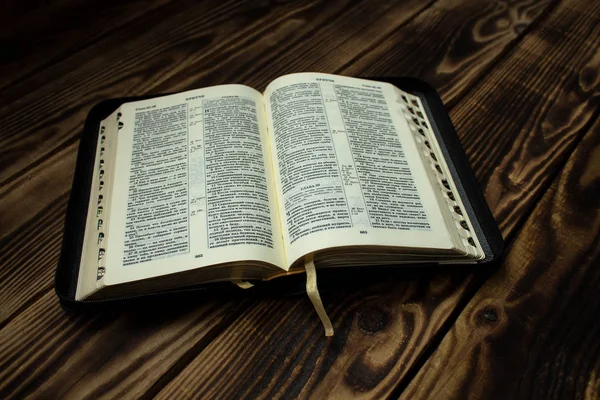 Bible on wooden board — Stock Photo, Image