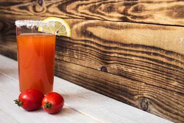 Tomato juice with salt lemon and tomatos — Stock Photo, Image