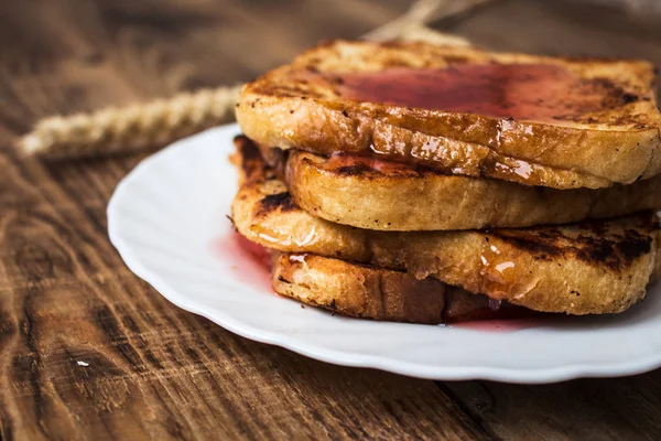 Stack of french toast on wooden background — Stock Photo, Image