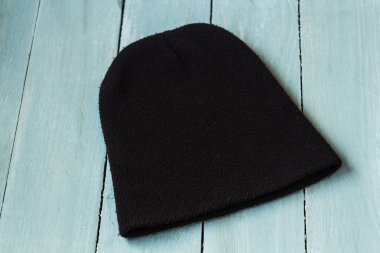 gri bir ahşap bacground kahverengi şapka