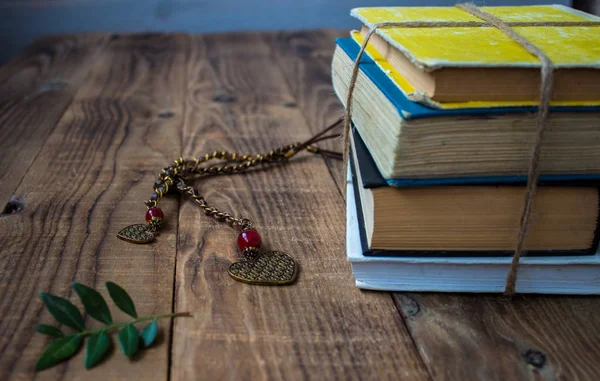 Old books tied with a rope — Stock Photo, Image