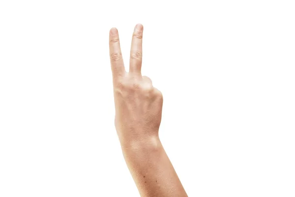Uma mulher mão mostrando sinal de vitória no fundo branco — Fotografia de Stock