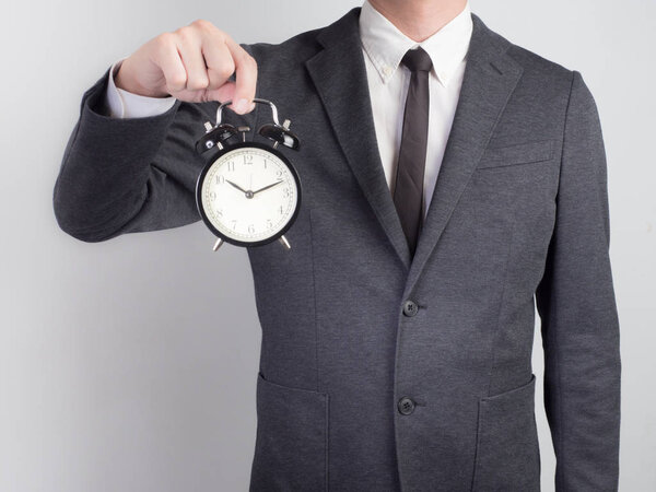 Businessman confirm project .Idea business on white background.he hold clock.