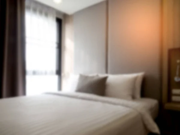 Interno di accogliente camera da letto in moderno design.low illuminazione e lente — Foto Stock