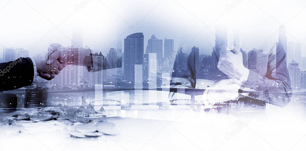 Double exposure of success business man city background.time for