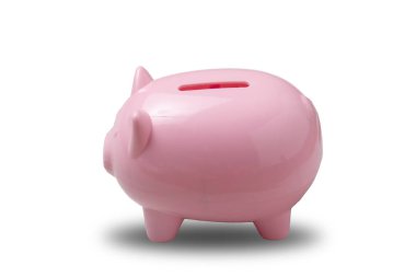 Paraları beton zemin üzerine kumbara pembe renk dolu. S