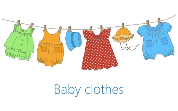 Babykläder hänga på klädstreck — Stock vektor