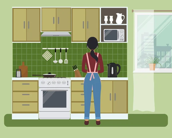 Cozinha em uma cor verde. Há uma mulher perto do fogão que prepara comida. — Vetor de Stock