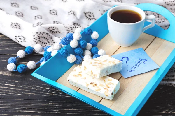 Egypt nougat and cup of coffee in tray