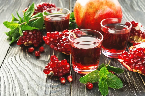 Pomegranate juice with fresh fruits and mint — Stock Photo, Image