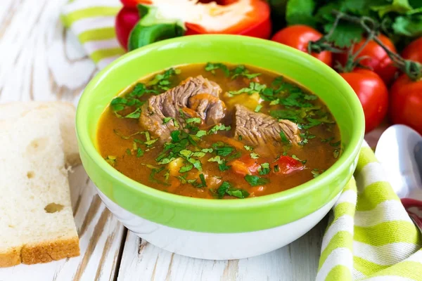 Caucasian lamb or beef Shurpa soup with vegetables — Stock Image Caucasian lamb or beef Shurpa soup with vegetables Stock Photo