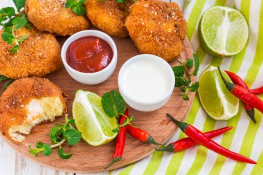 Spanish croquetas (croquettes) with shrimp, mint and chilly clipart