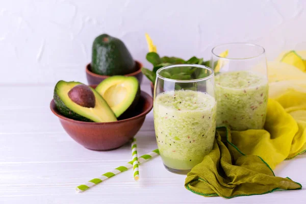 Green smoothie with avocado, spinach and celery. Healthy food