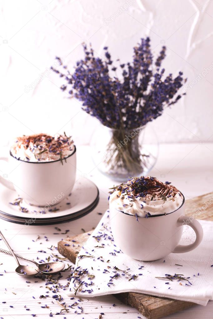 Two cups of hot chocolate with whipped cream