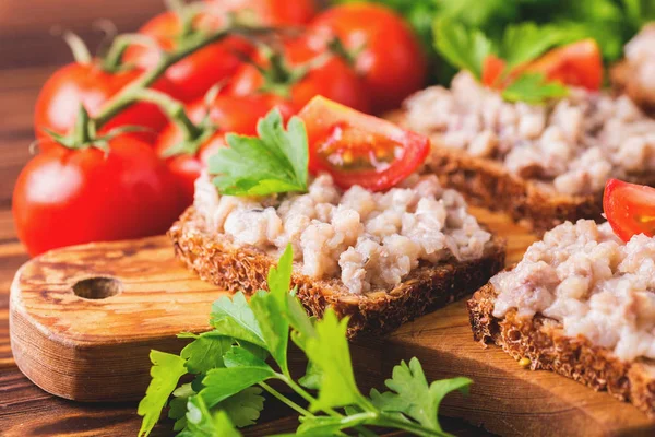 Toast with kosher Forshmak paste, parsley and cherry tomatoes — Stock Photo, Image