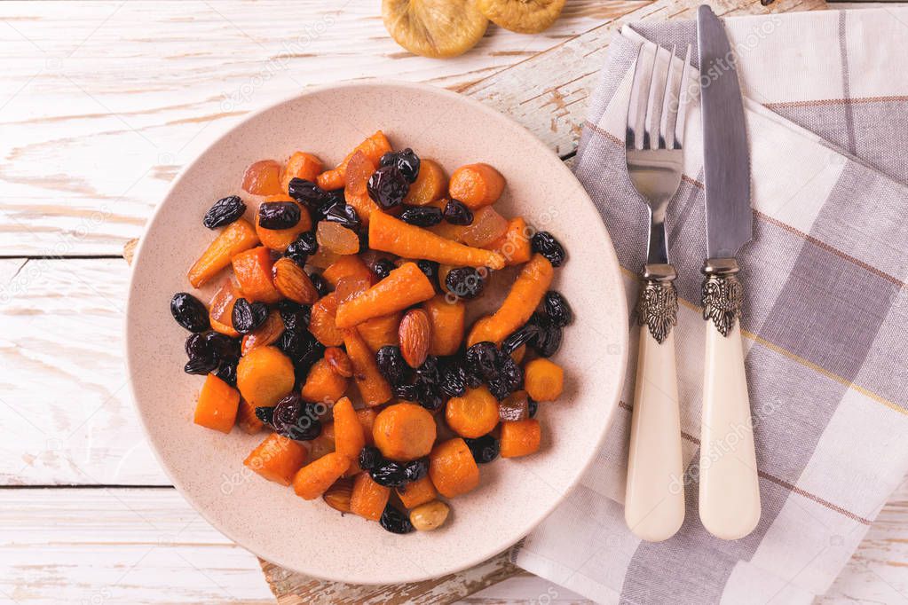 Jewish Tzimmes dessert with carrot, raisins and dried fruits
