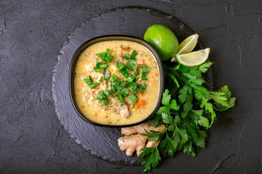 Indian Mulligatawny soup with lentil, parsley. Copyspace, top vi clipart