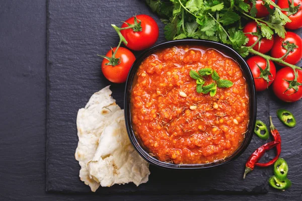 Indian Tomato Rasam with lentil, mint, cilantro and cashew — Stock Photo, Image