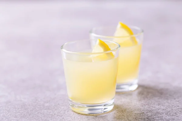 Italian lemon lime liqueur limoncello with ice and mint — Stock Photo, Image