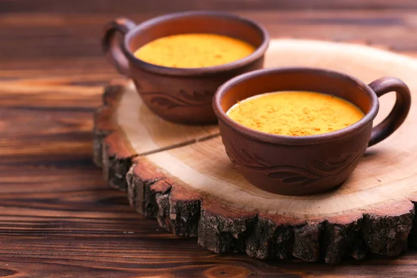 Indian turmeric milk with saffron, cardamom and turmeric. Copysp — Stock Photo, Image