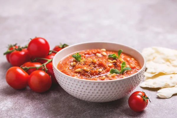 Indian Tomato Rasam with lentil, mint, cilantro and cashew — Stock Photo, Image