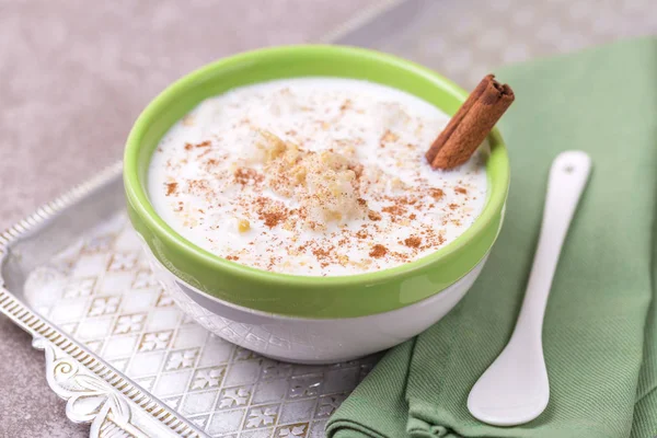 Brazilian winter festival dessert Canjica. White corn porridge