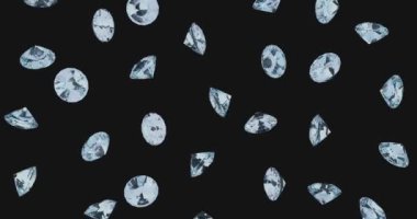 Elmaslar ve mücevherler siyah zemin üzerine düşüyor.